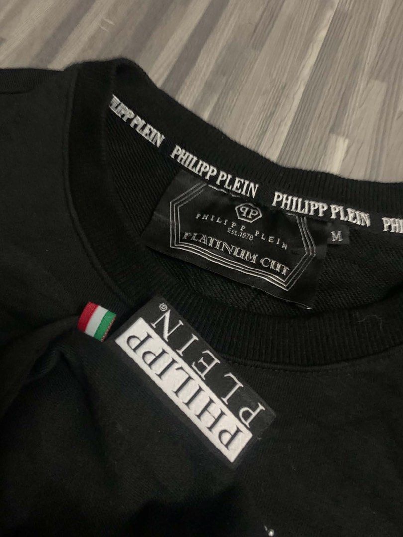 Philipp Plein Platinum Cut Skull Sequin Sweatshirt (Category: Coats, Jackets and Outerwear) located in Manila. Submitted by blaze_213 (Listing ID 1463740598, Image 1). Description: - Brand: Philipp Plein - Color: Black - Size: M - Features: Large sequin skull graphic on front - Line: Platinum Cut - Origin: Made in Italy - Style: Statement piece.