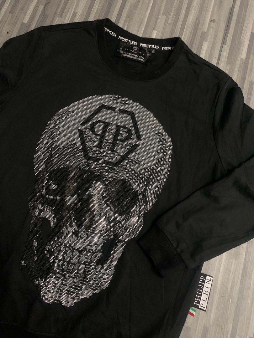 Philipp Plein Platinum Cut Skull Sequin Sweatshirt (Category: Coats, Jackets and Outerwear) located in Manila. Submitted by blaze_213 (Listing ID 1463740598, Image 2). Description: - Brand: Philipp Plein - Color: Black - Size: M - Features: Large sequin skull graphic on front - Line: Platinum Cut - Origin: Made in Italy - Style: Statement piece.