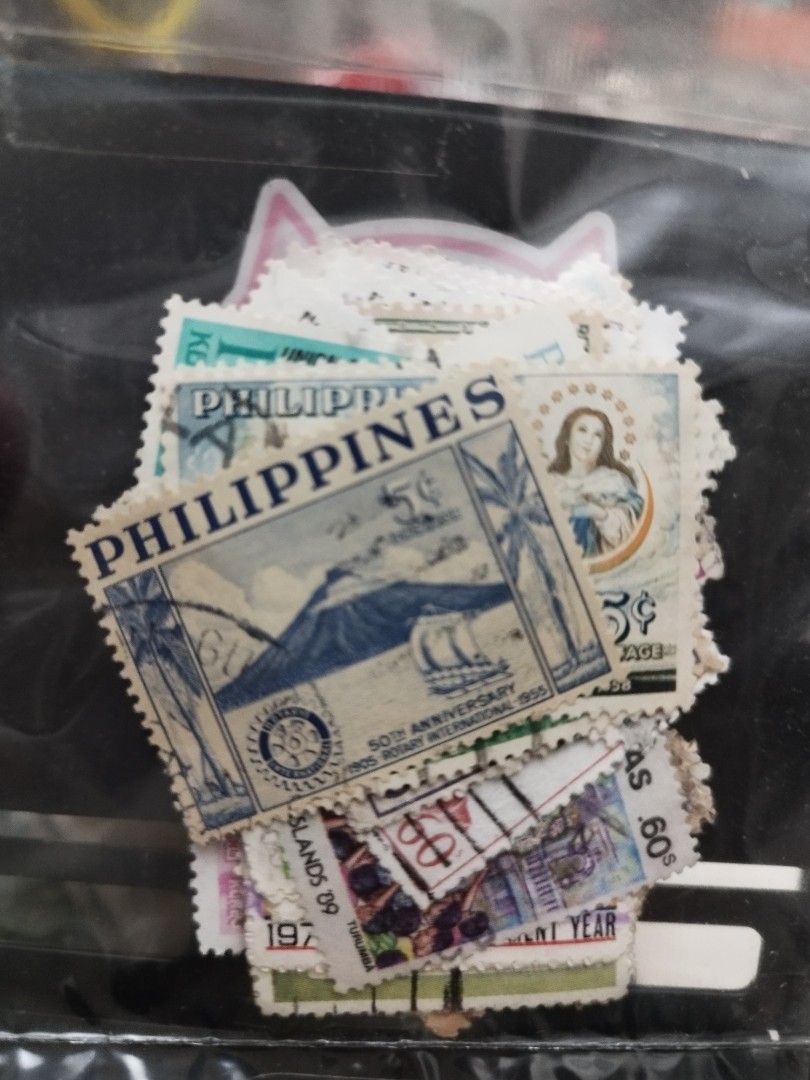 Philippine Stamps Collection (Category: Stamps & Prints) located in Paranaque City. Submitted by heyitsmeaj (Listing ID 1463654997, Image 2). Description: - Assorted collection of stamps from the Philippines and various countries. - Features a special 50th Anniversary stamp from 1955. - Ideal for stamp collectors and enthusiasts..