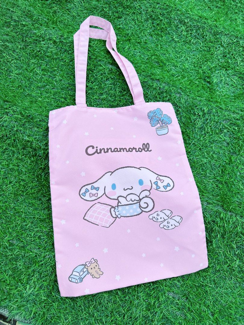 Pink Cinnamoroll Tote Bag (Category: Tote Bags) located in Manila. Submitted by ronoarabbit.ph (Listing ID 1463668224, Image 1). Description: KUJI ITEM from Japan - Adorable pink tote bag featuring Cinnamoroll and friends. - Perfect for everyday use. - Makes a great gift! - Easy-to-carry handles. 📌Payment First Policy, NO COD 📌 First to pay, no long reservations 📍Loc: Manila.