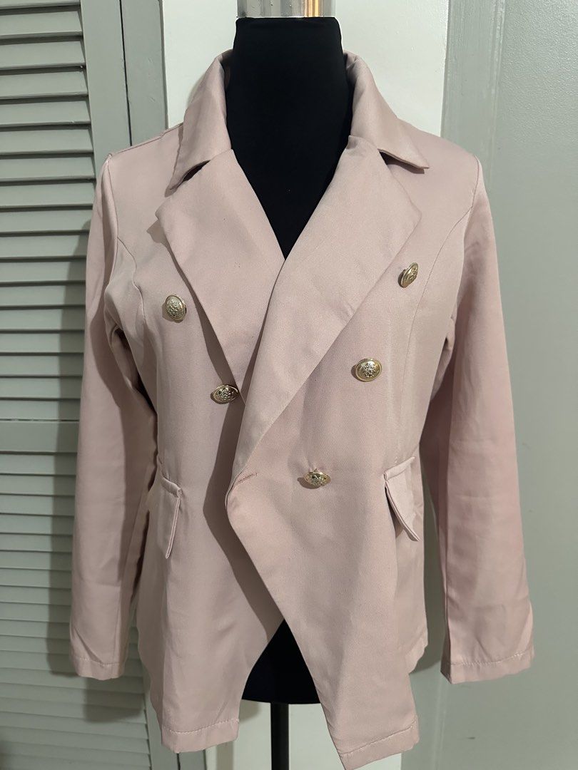 Pink Double-Breasted Blazer with Gold Buttons (Category: Coats, Jackets and Outerwear) located in Subic. Submitted by ruffa_assorted_item (Listing ID 1463633438, Image 1). Description: - Pink double-breasted blazer - Features elegant gold button details on front and cuffs - Classic lapel collar design - Versatile for both professional and evening occasions - Ideal for layering to elevate any outfit.