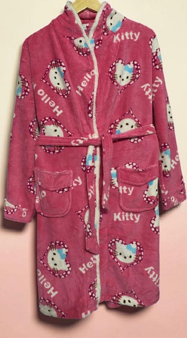 Pink Hello Kitty Fleece Robe (Category: Coats, Jackets and Outerwear) located in Manila. Submitted by gutierrez23265 (Listing ID 1463613362, Image 2). Description: -HELLO KITTY Super soft pink fleece material - Adorable all-over Kitty and heart print - Cozy white fuzzy trim on edges and collar - Includes a matching tie belt - Two convenient front pockets - Ideal for ultimate home comfort and lounging UNUSED PREOWN CUT KO LANG ANG TAG MINE NOW PAY