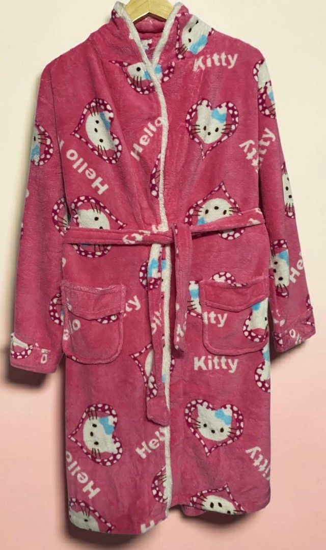 Pink Hello Kitty Fleece Robe (Category: Coats, Jackets and Outerwear) located in Manila. Submitted by gutierrez23265 (Listing ID 1463613362, Image 1). Description: -HELLO KITTY Super soft pink fleece material - Adorable all-over Kitty and heart print - Cozy white fuzzy trim on edges and collar - Includes a matching tie belt - Two convenient front pockets - Ideal for ultimate home comfort and lounging UNUSED PREOWN CUT KO LANG ANG TAG MINE NOW PAY