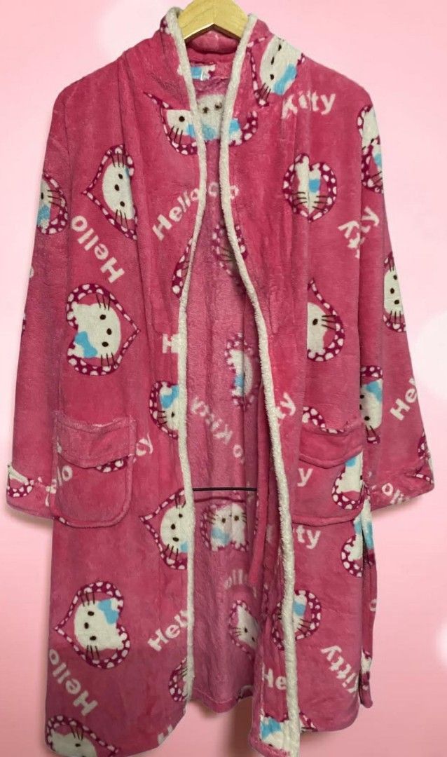 Pink Hello Kitty Fleece Robe (Category: Coats, Jackets and Outerwear) located in Manila. Submitted by gutierrez23265 (Listing ID 1463613362, Image 3). Description: -HELLO KITTY Super soft pink fleece material - Adorable all-over Kitty and heart print - Cozy white fuzzy trim on edges and collar - Includes a matching tie belt - Two convenient front pockets - Ideal for ultimate home comfort and lounging UNUSED PREOWN CUT KO LANG ANG TAG MINE NOW PAY