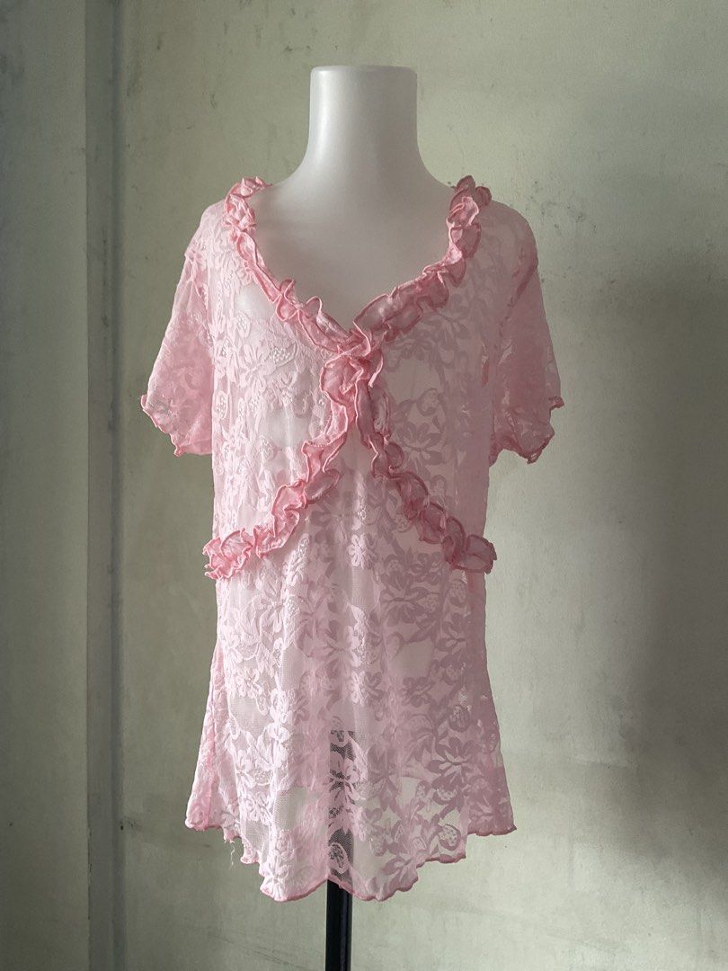 Pink Lace Top with Ruffles (Category: Sleeveless) located in Manila. Submitted by horangborahae (Listing ID 1463604209, Image 1). Description: - Adorable pink lace top - Short sleeves with delicate ruffle trim - Flattering V-neckline, also with ruffles - Sheer fabric - pair with a camisole or bralette - Ideal for stylish layering or a fun, playful outfit - Lightweight and airy for comfortable wear.