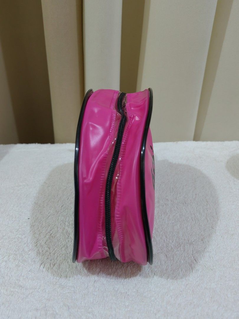 Pink Rabbit Cosmetic Bag (Category: Purses & Pouches) located in Makati City. Submitted by prelovedtreatedwithlove (Listing ID 1463739943, Image 3). Description: - Adorable pink cosmetic bag - Features 'Rabbit' and 'SEXY ME X-ME' text - Secure zipper closure - Ideal for storing makeup and small essentials - Compact and easy to carry - no issue .