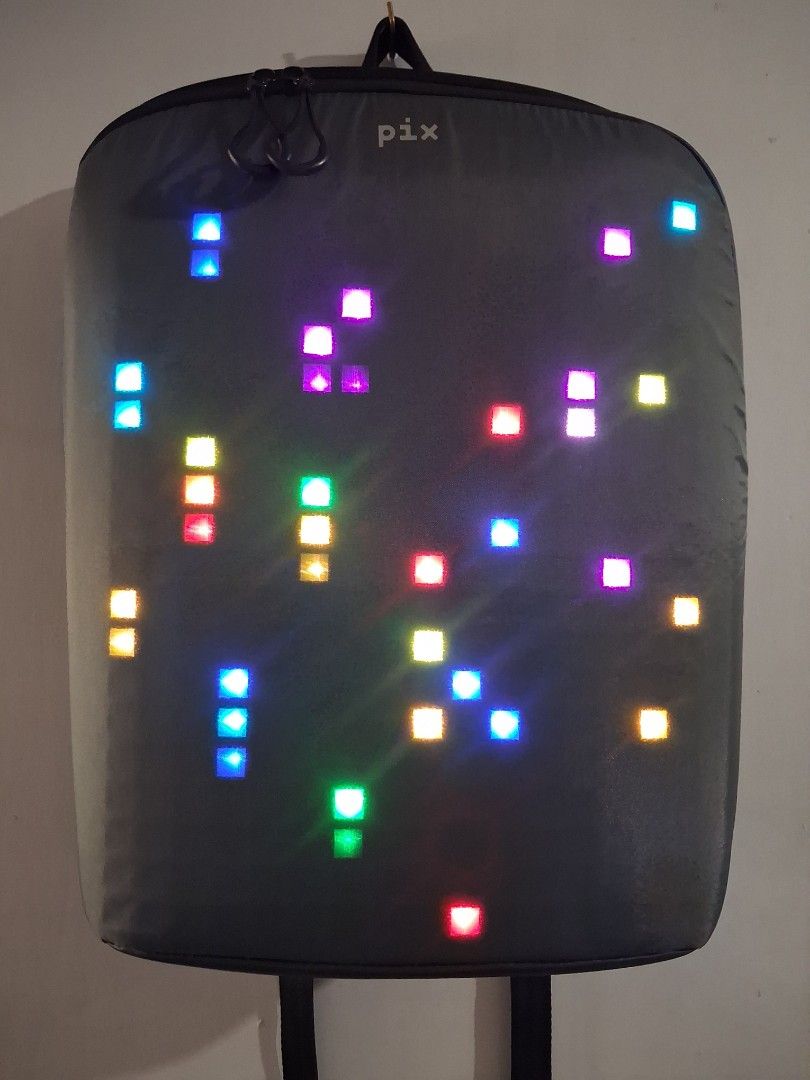 PIX Waterproof Laptop Backpack With Programmable Led Lights (Category: Laptop Bags & Sleeves) located in Mandaluyong City. Submitted by daddyjpanlilio24 (Listing ID 1463557371, Image 3). Description: P 1650+sf Can pass as new padala hindi nagamit Pix Waterproof Back Pack (15" Laptop Compartment)With Customizable Led Lighting Needs powerbank to power the led lights Download the pix app in playstore and connect via bluetooth to customize the led li