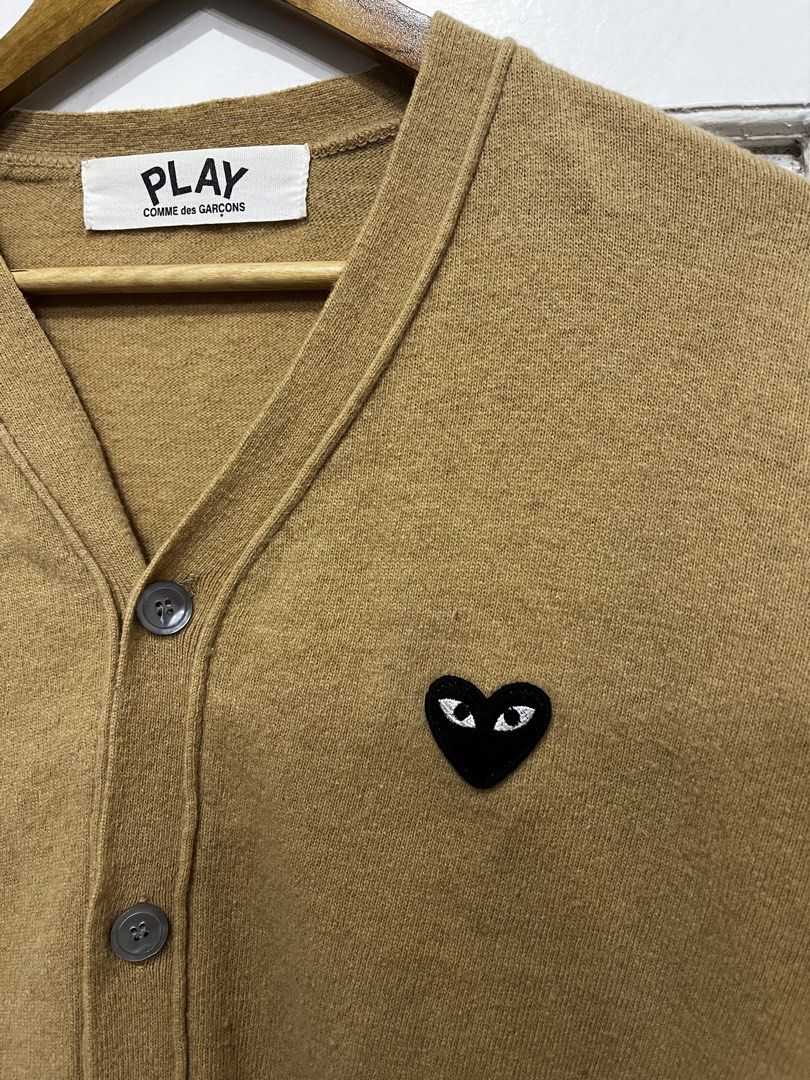 Play CDG Cardigan (Category: Others Tops) located in Davao. Submitted by archived.status (Listing ID 1463682552, Image 2). Description: COLOR MAY VARY DUE TO LIGHTING‼️ Condition: 9.5/10 Color rate: 9.5/10, or better Issue: needs wash only Size Small Width 23.5 Length 25.