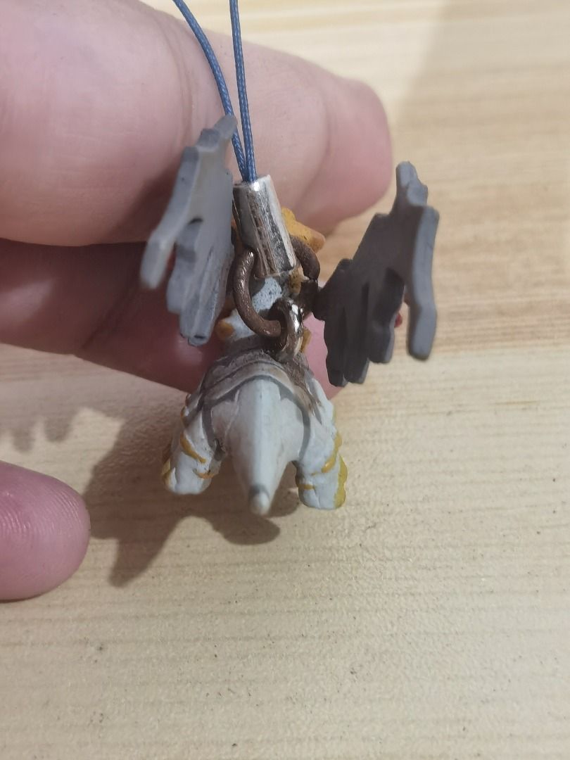 Pokemon - Giratina Figure Charm (Category: Character Goods) located in Taguig. Submitted by kalabasza (Listing ID 1463567877, Image 3). Description: 📌 This is a preloved item. Please manage your expectation. 📌 Actual item posted. 📌 Rusty po metal niya. As is. 📌 Product Color may slightly vary due to Photographic Lighting. 📌 Location: Taguig 📌 MOP: GCash. Payment first before ship. 📌 MOD: J&T, LBC, GoGo or Lalamove. 📌 DF/SF at buyer's expe