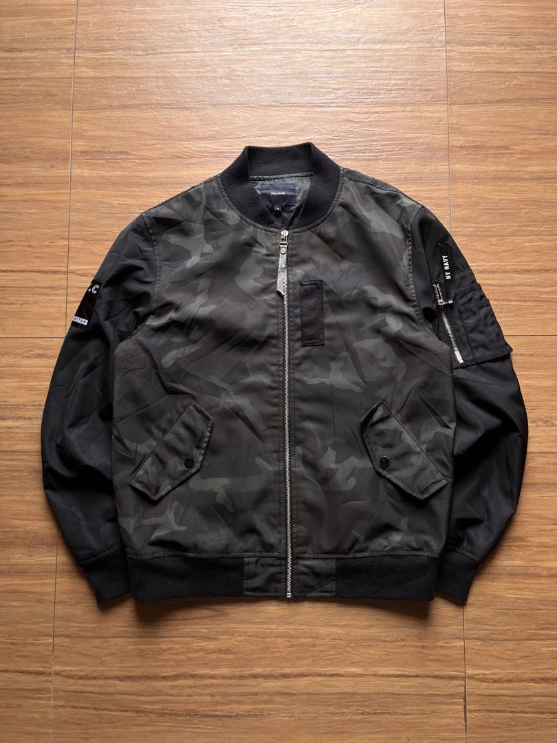 Polham Army Camo Ma-1 Bomber Jacket (Category: Coats, Jackets and Outerwear) located in Davao. Submitted by spilled.bins (Listing ID 1463682894, Image 1). Description: Polham Army Camo Ma-1 Bomber Jacket Width: 21in Length: 25.5in Large Measurement | Can Fit Medium Light Discoloration Excellent Condition Mine: ₱800 . +shipping fee on top . Model Reference: Height: 5’5 feet Weight: 68kg.
