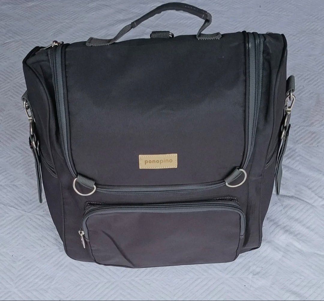 Ponopino Diaper Bag Backpack - Dark Grey (Category: Backpacks) located in Quezon City. Submitted by pattycloset08 (Listing ID 1463559632, Image 3). Description: - Dark grey Ponopino diaper bag - Multiple compartments for organization - Insulated pocket for bottles - Convenient side pocket for easy access - Versatile: wear as a backpack or carry by top handle - Ideal for parents on the go.