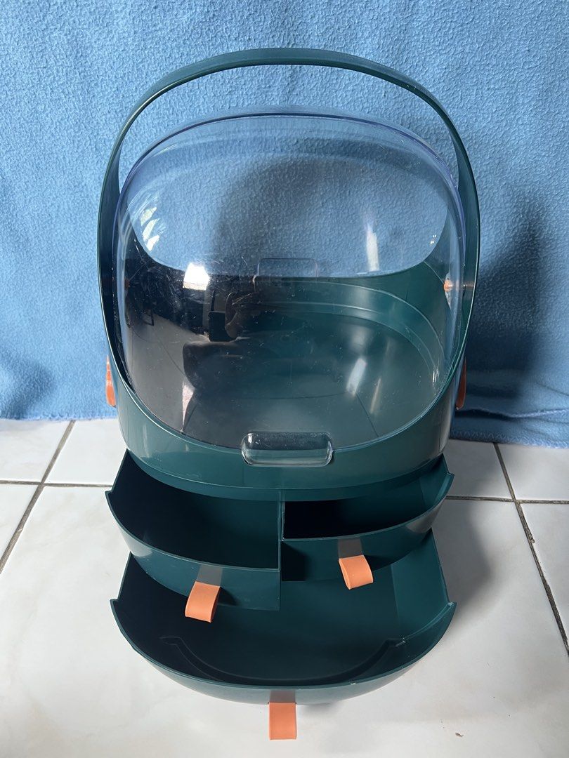 Portable Makeup Organizer with Handle and Drawers (Category: Accessory Holder, Box & Organizers) located in Antipolo. Submitted by viadeclutters (Listing ID 1463661740, Image 3). Description: Dark green makeup organizer with clear lid and handle. Features three drawers and a spacious main compartment. Compact and easy to store. Can be converted into 2 separate organizers. 23cmL x 21cmW x 30cmH.