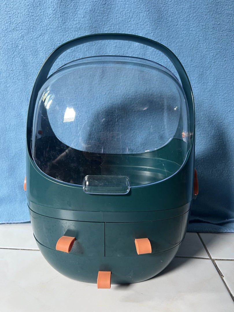 Portable Makeup Organizer with Handle and Drawers (Category: Accessory Holder, Box & Organizers) located in Antipolo. Submitted by viadeclutters (Listing ID 1463661740, Image 1). Description: Dark green makeup organizer with clear lid and handle. Features three drawers and a spacious main compartment. Compact and easy to store. Can be converted into 2 separate organizers. 23cmL x 21cmW x 30cmH.