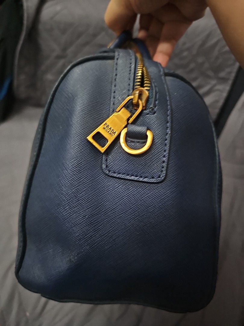 Prada 2way bag (Category: Cross-body Bags) located in Manila. Submitted by shopaholicmimi (Listing ID 1463693650, Image 2). Description: preloved prada saffiano bag minor flaws as seen on photos with replaced sling provided😊 not coach, erfo, legacy, soho, vintage, gucci, chanel, lv,.
