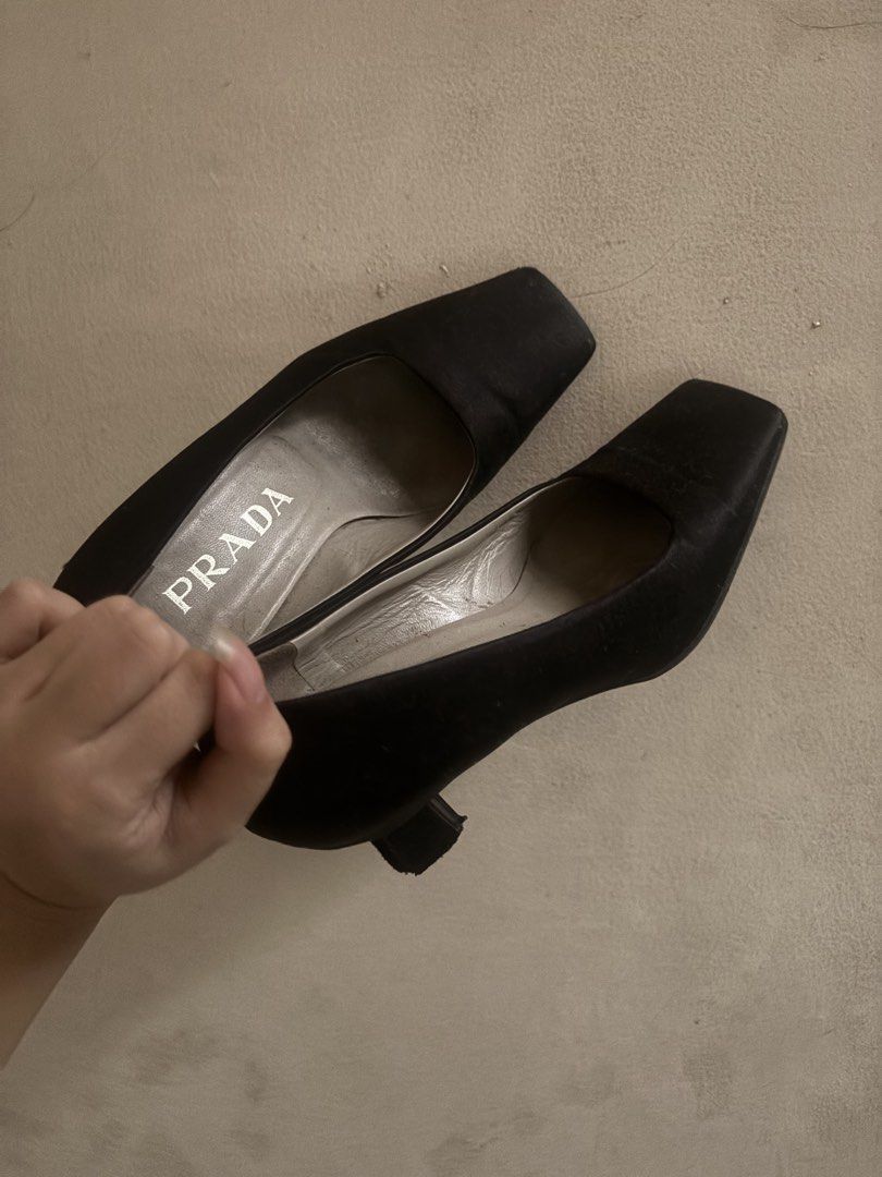 Prada Black Satin Square Toe Heels (Category: Heels) located in Quezon City. Submitted by santimartelino (Listing ID 1463684225, Image 1). Description: - Prada heels (authenticity not guaranteed) - black satin material, square toe, block heels - size 36 as stated on the sole - bought on carousell as well, but haven’t worn since it’s too big on me - no heel caps.