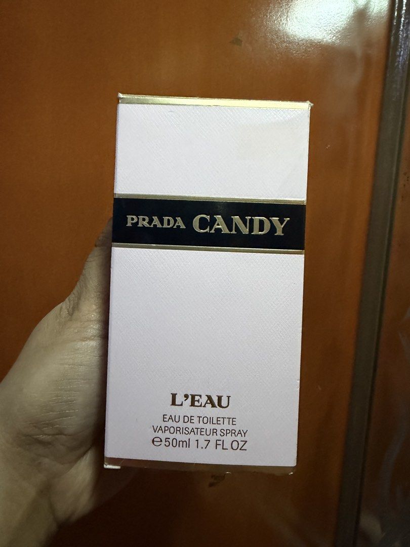 Pr@d@ Candy L'Eau Eau de Toilette 50ml (Category: Fragrance & Deodorants) located in Pasig City. Submitted by aprilluxcloset0812 (Listing ID 1463709165, Image 1). Description: - Prada Candy L'Eau Eau de Toilette (50% full) - Natural spray vaporisateur - 50ml (1.7 fl oz) - Made in Spain - Ideal for daily use or special events - Half Full already RFS: decluttering EVERYTHING MUST GO‼️Just make a reasonable offer ❤️ All items ON HAND, handled with l