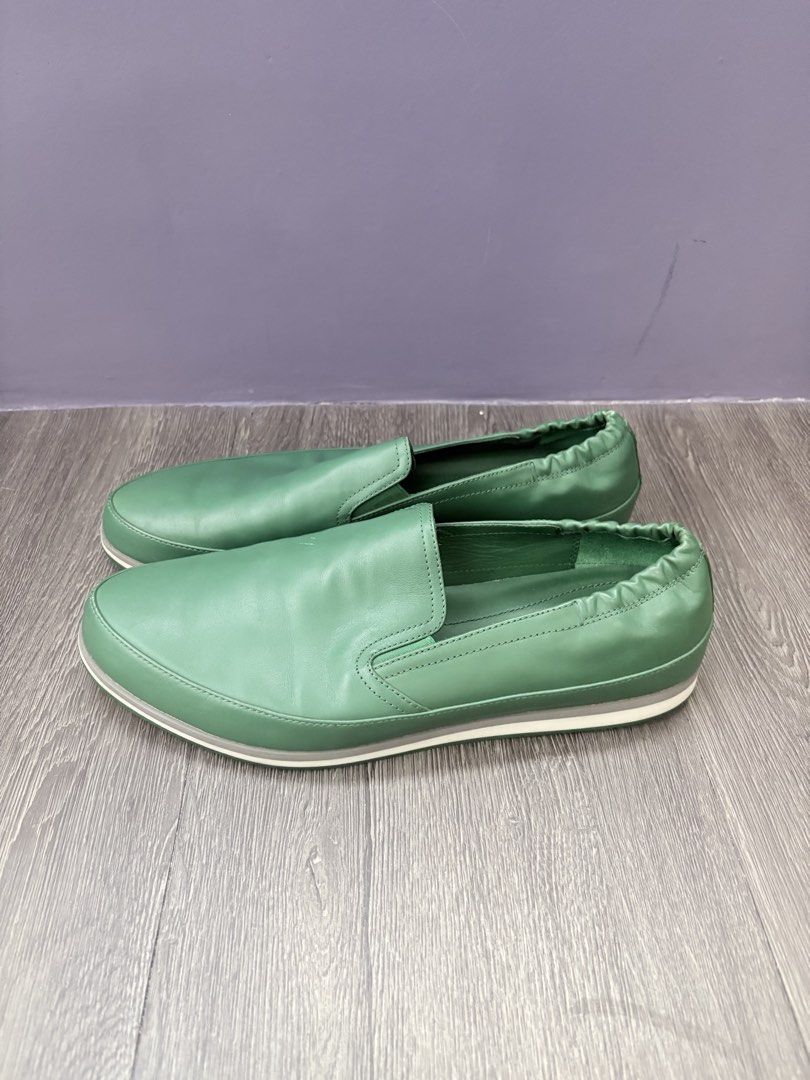 Prada Green Leather Slip-On Shoes (Category: Casual Shoes) located in Pasig City. Submitted by tepdorotheo (Listing ID 1463615129, Image 2). Description: - Vibrant green, yellow and light blue Prada slip-on shoes - Made from soft leather and suede - Elasticated sides for a comfortable fit - Green soles with a small red Prada tab - Ideal for casual wear -size 38.5.