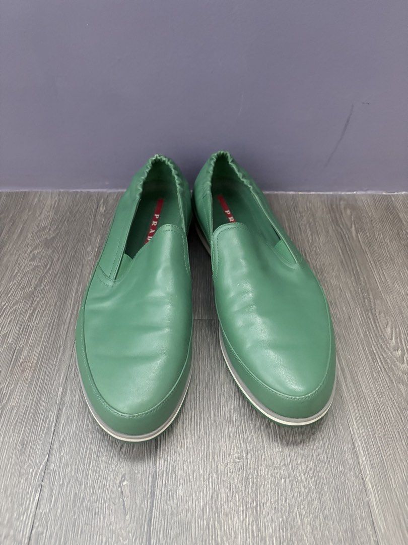 Prada Green Leather Slip-On Shoes (Category: Casual Shoes) located in Pasig City. Submitted by tepdorotheo (Listing ID 1463615129, Image 1). Description: - Vibrant green, yellow and light blue Prada slip-on shoes - Made from soft leather and suede - Elasticated sides for a comfortable fit - Green soles with a small red Prada tab - Ideal for casual wear -size 38.5.