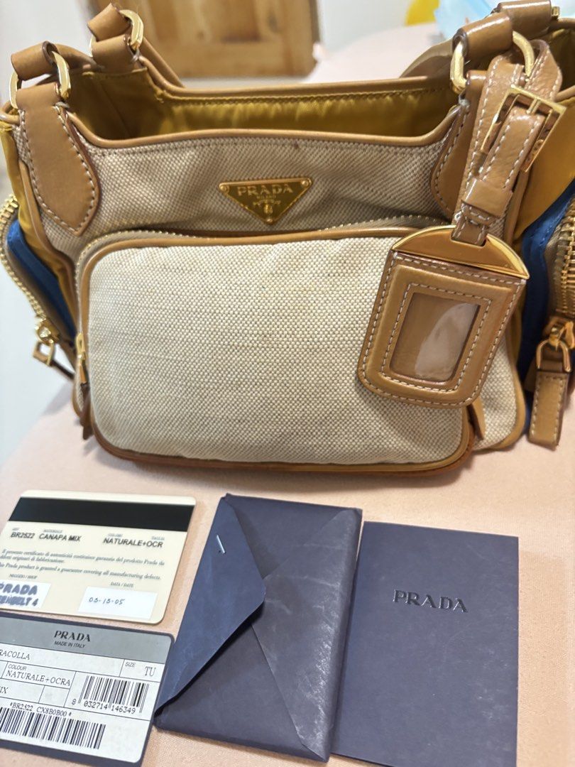 Prada Tessuto Nylon Canvas Shoulder Bag y2k cargo (Category: Luxury Bags & Wallets) located in Bulacan. Submitted by ricammendz (Listing ID 1463693152, Image 1). Description: No-hanggle last price posted - Authentic Prada bag -with flaw see last photo - Combination of canvas and nylon material - Tan leather trim and handles - Multiple zippered pockets - Comes with authenticity cards and dust bag - Great for everyday use.