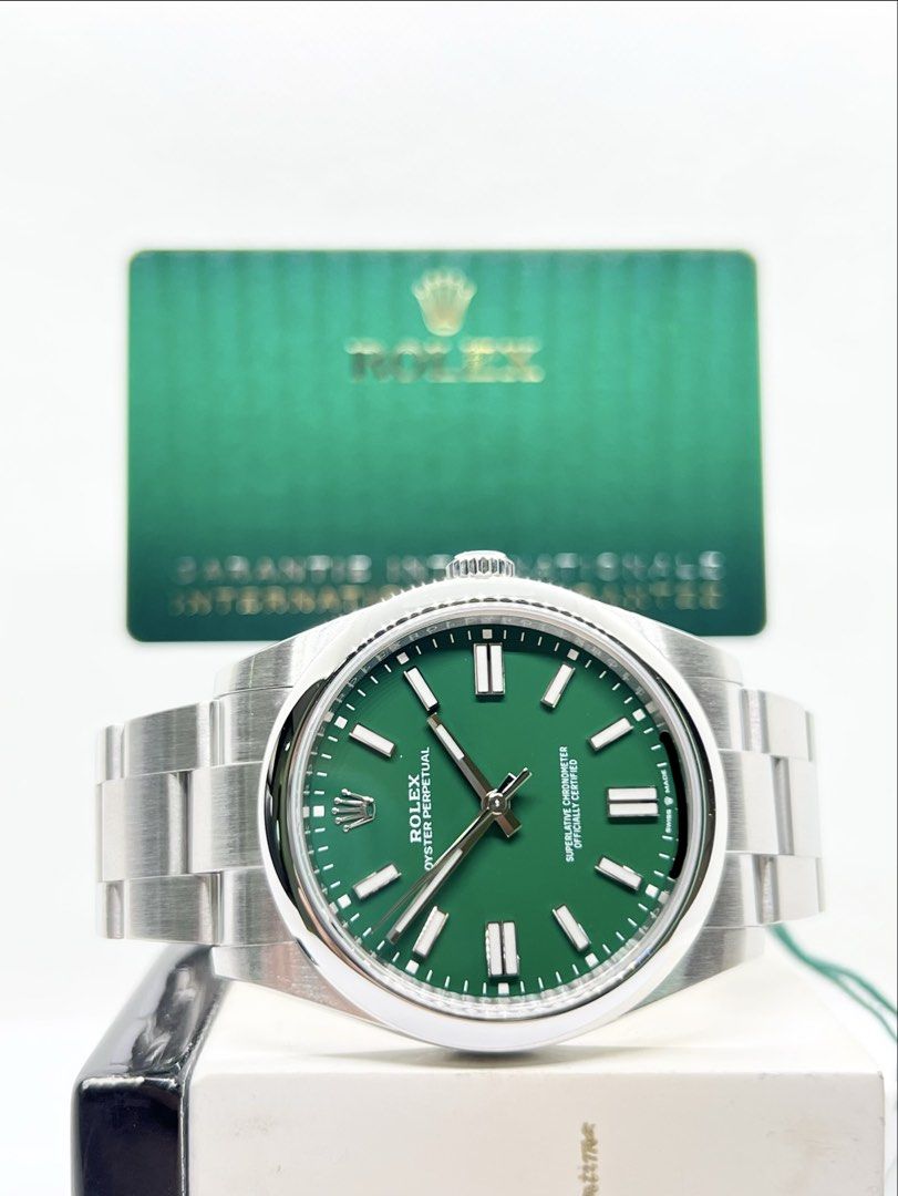 Pre Owned Rolex Oyster Perpetual 41 124300 Green Dial Automatic Steel Casing Bracelet ( Apr 22 ) (Category: Watches) located in Singapore. Submitted by brightime (Listing ID 1463659996, Image 1). Description: Pre Owned Rolex Oyster Perpetual 41 124300 Green Dial Automatic Steel Casing Bracelet ( Apr 22 ) ** Pre-Owned ** ** Mint Condition ** Model : 124300 Also known as : Oyster Perpetual 41 Case size : 41mm Dial : Green Dial With Luminous Baton N