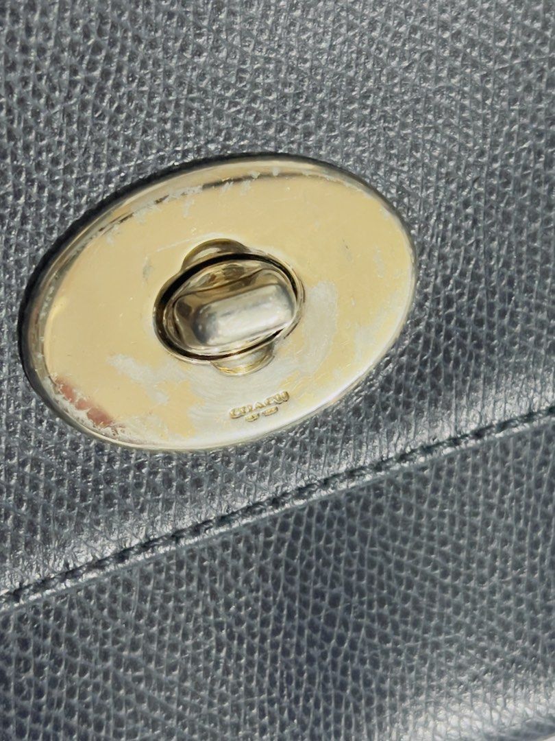 Preloved authentic Coach Pebbled Leather Crossbody Bag with Chain Strap (Category: Cross-body Bags) located in Binan City. Submitted by unicohijoxfudge (Listing ID 1463655631, Image 3). Description: - Dark blue pebbled leather crossbody bag - Secure gold turn-lock closure - Interior Coach creed patch - Detachable gold chain strap - Detachable leather shoulder strap - Versatile for everyday or evening wear Size: 9.5 x 6 inches height Delivery c/o 