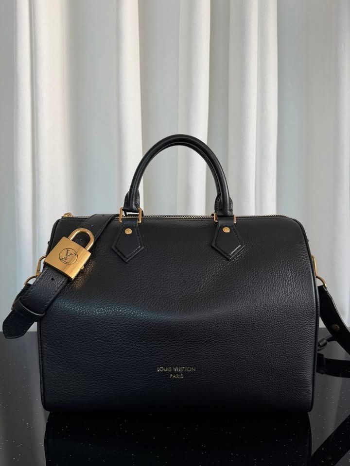 Preloved Lv Low Key Speedy Soft 30 (Category: Luxury Bags & Wallets) located in Manila. Submitted by bagsandshoesmanymore (Listing ID 1463664218, Image 1). Description: Lv Speedy Soft 30 Size 30cm Microchip scannable serial Grained calf leather Calf-leather trim Suede calfskin lining Age-gold hardware Zipper closure 1 flat inside monogram canvas pocket Strap Removable, Adjustable Made in France.
