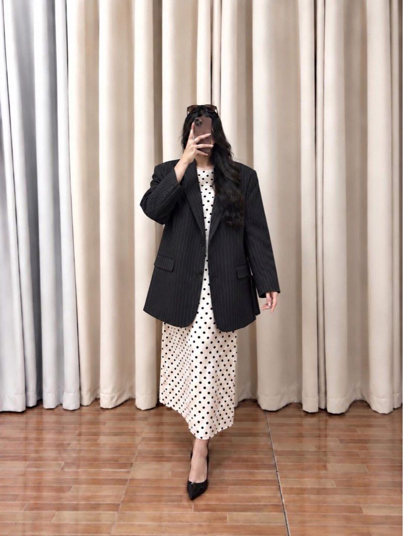 Premium Black Pinstriped Blazer (Category: Coats, Jackets and Outerwear) located in Taguig. Submitted by vm.co (Listing ID 1463730317, Image 1). Description: Perfect for: • Corporate office wear • Business travel • Smart casual outfits • Rainy or cool weather • Capsule wardrobe • Everyday sophisticated styling Condition: Appears to be in very good preloved condition with no visible major stains, tears, or discoloration in the photo. A light steam