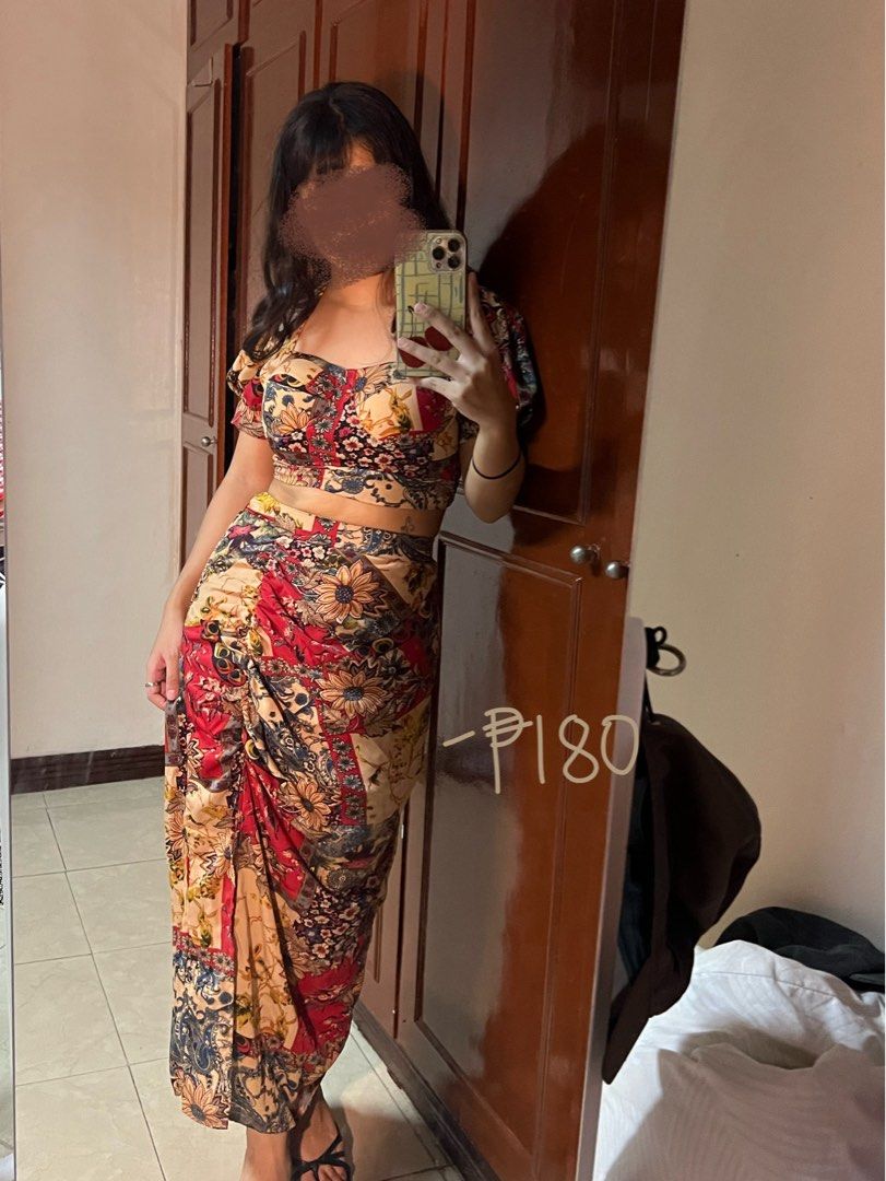 Printed Crop Top and Ruched Skirt Set (Category: Sets or Coordinates) located in Bacoor. Submitted by jazzgtrrz (Listing ID 1463646702, Image 1). Description: - Adorable two-piece set with a vibrant floral print. - Features a trendy cropped top with short sleeves. - Complemented by a stylish ruched midi skirt. - Made from light and flowy fabric for comfort. - Ideal for casual outings, beach days, or any sunny adventure! - Selling for only P180!.