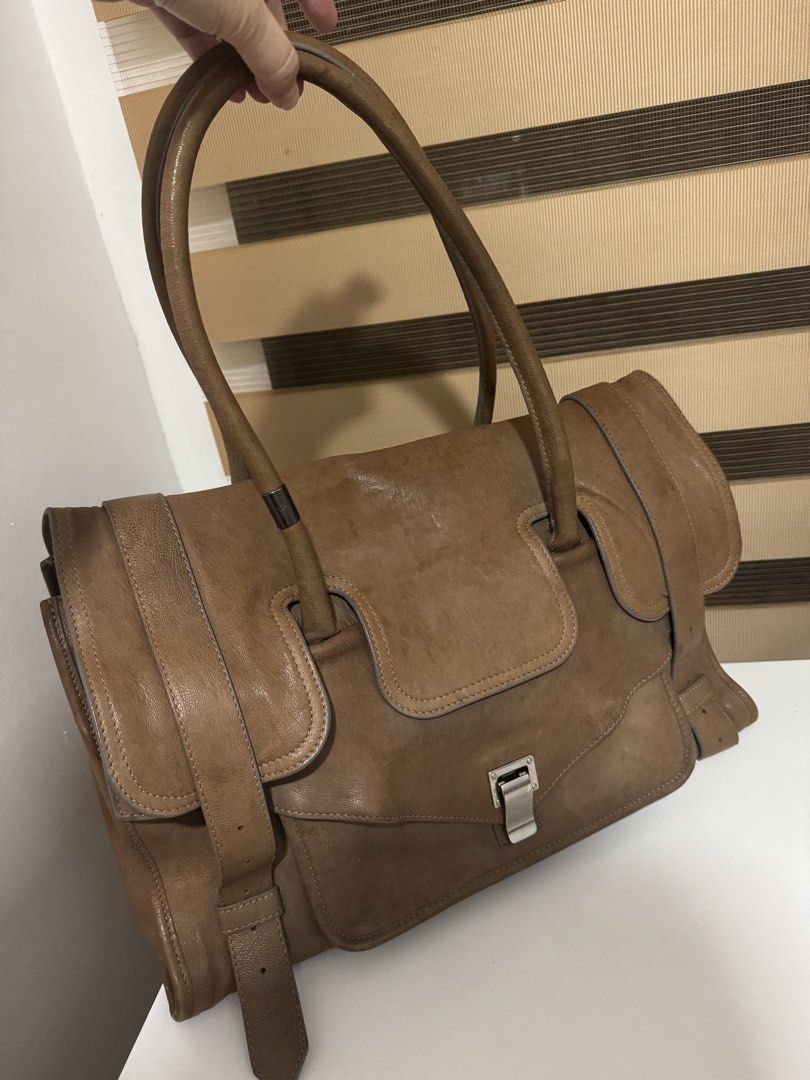 Proenza Schouler PS1 Keep All bag (Category: Tote Bags) located in Angeles City. Submitted by thala.1204.68 (Listing ID 1463678369, Image 3). Description: - Authentic Proensa Schouler PS1 Keep All Bag - Soft leather with a nice slouch - Secure clasp closure at the front - Interior zip pocket and slip pocket - Comfortable shoulder straps - Great everyday and travel bag.