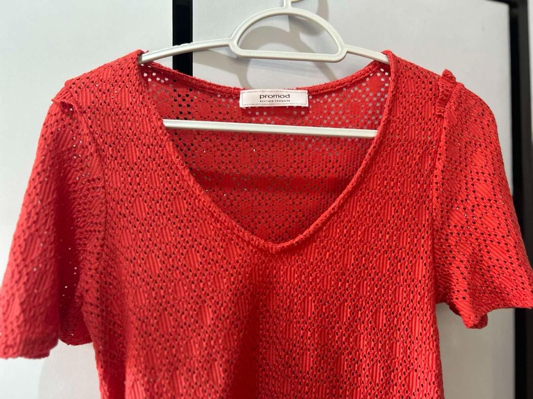PROMOD Ruffled hem (Category: Blouses) located in Pasig City. Submitted by ladyleslieisletavelarde4902 (Listing ID 1463571095, Image 2). Description: Beautiful and eye-catching PROMOD red top with delicate open-knit details and a cute ruffled hem. Perfect for a feminine, stylish look! ✨ Brand: PROMOD • Color: Red • Style: Open-knit / Crochet Top • Size : S to M • Short sleeves • Ruffled hem • Condition: Excellent preloved condition like new.