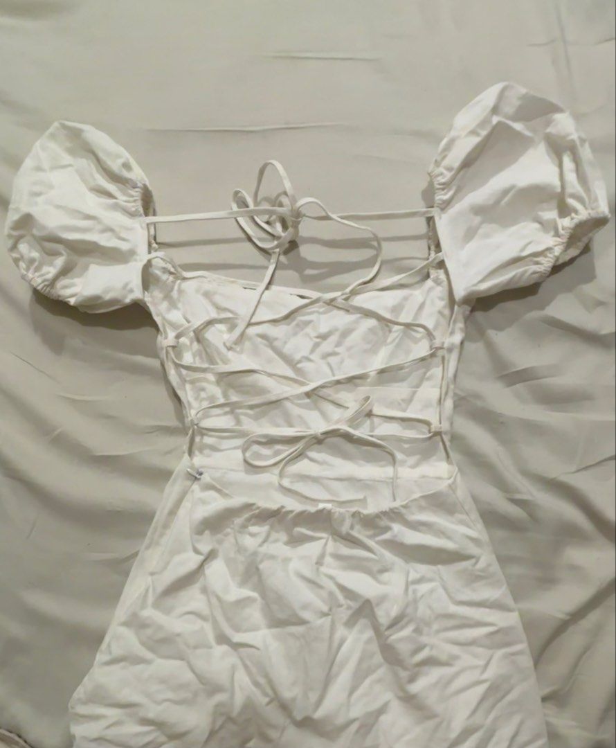Puff Sleeves Short Dress (Category: Dresses) located in Pasig City. Submitted by km.sc (Listing ID 1463657979, Image 2). Description: Used once for an event, it has a backless detail, short A-line dress.