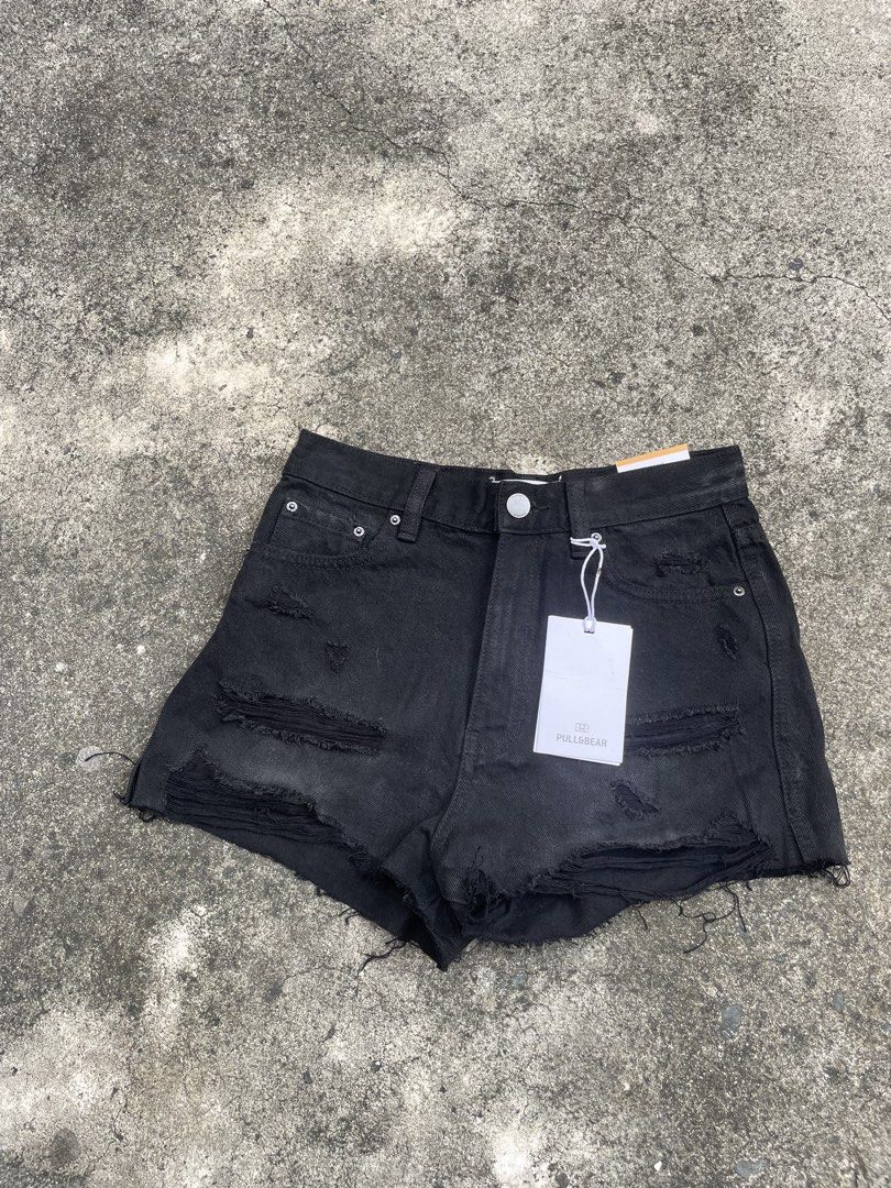 Pull & Bear Black Ripped Denim Shorts (Category: Shorts) located in Pasay City. Submitted by qptingz (Listing ID 1463633522, Image 1). Description: - Brand: Pull & Bear - Style: Black ripped denim shorts - Fit: High-waisted - Details: Raw hem, distressed - Occasion: Casual, edgy look - Size: 38 EU / 24 UK.