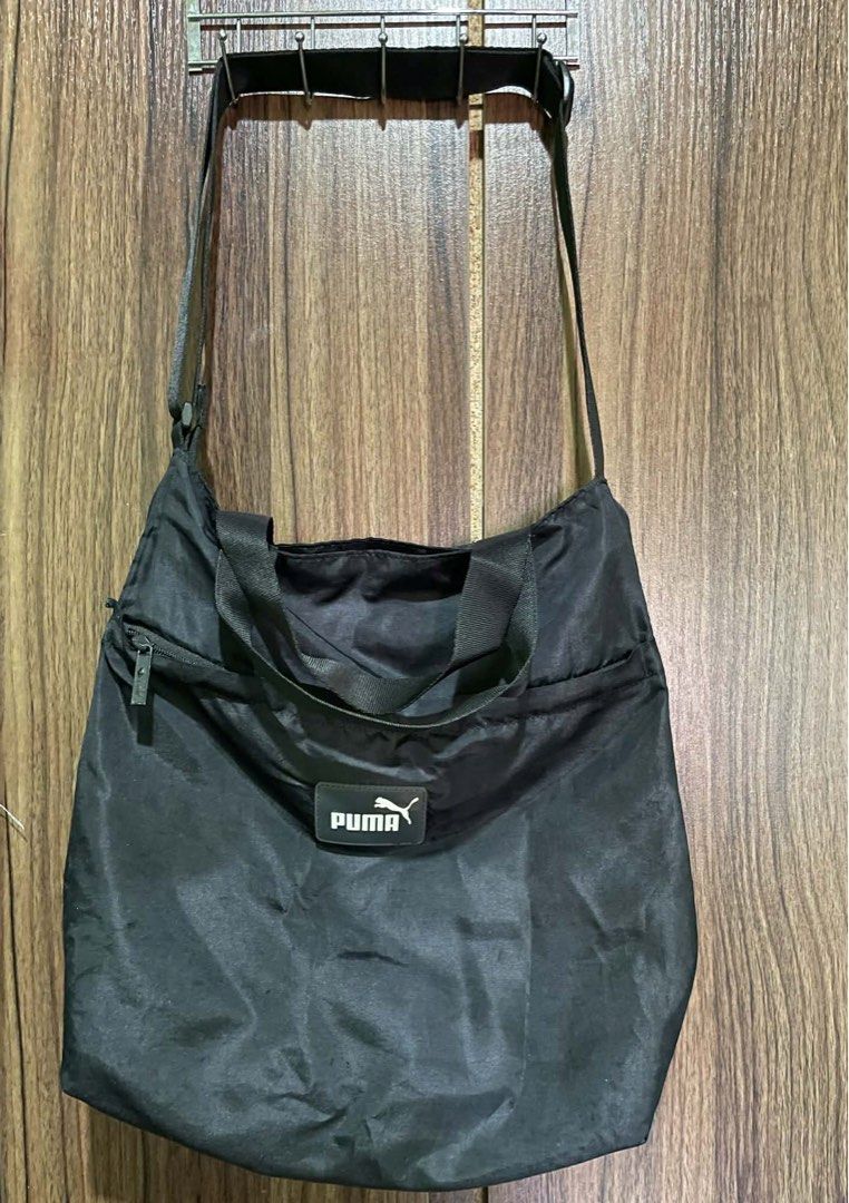 PUMA and ADIDAS bags (Category: Cross-body Bags) located in Muntinlupa City. Submitted by jani9 (Listing ID 1463574146, Image 1). Description: Selling these branded Puma and Adidas bags for ₱450/each. - Bought 3 years ago - Need wash - Haven’t used for over a year now.