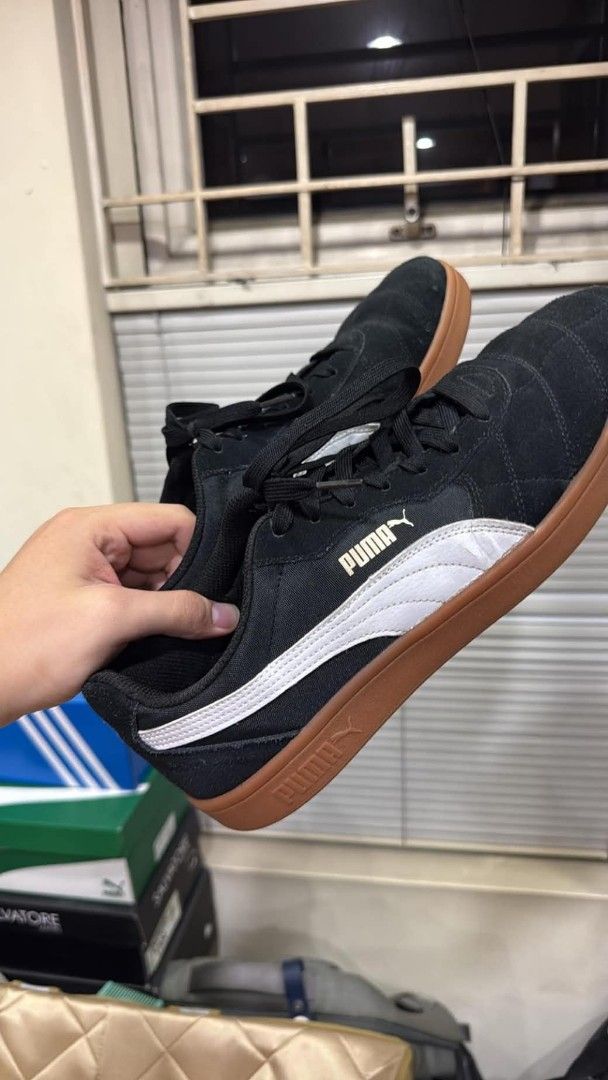 Puma astro kick (Category: Sneakers) located in Manila. Submitted by ralf015 (Listing ID 1463718886, Image 2). Description: - Brand: Puma - Style: Suede Indoor Soccer Shoes - Color: Black with white accents - Sole: Gum sole - Size: US 12 / UK 11 / EUR 46 - Features: Puma logo on side and sole, soft foam insole - Ideal for: Casual wear, indoor sports.