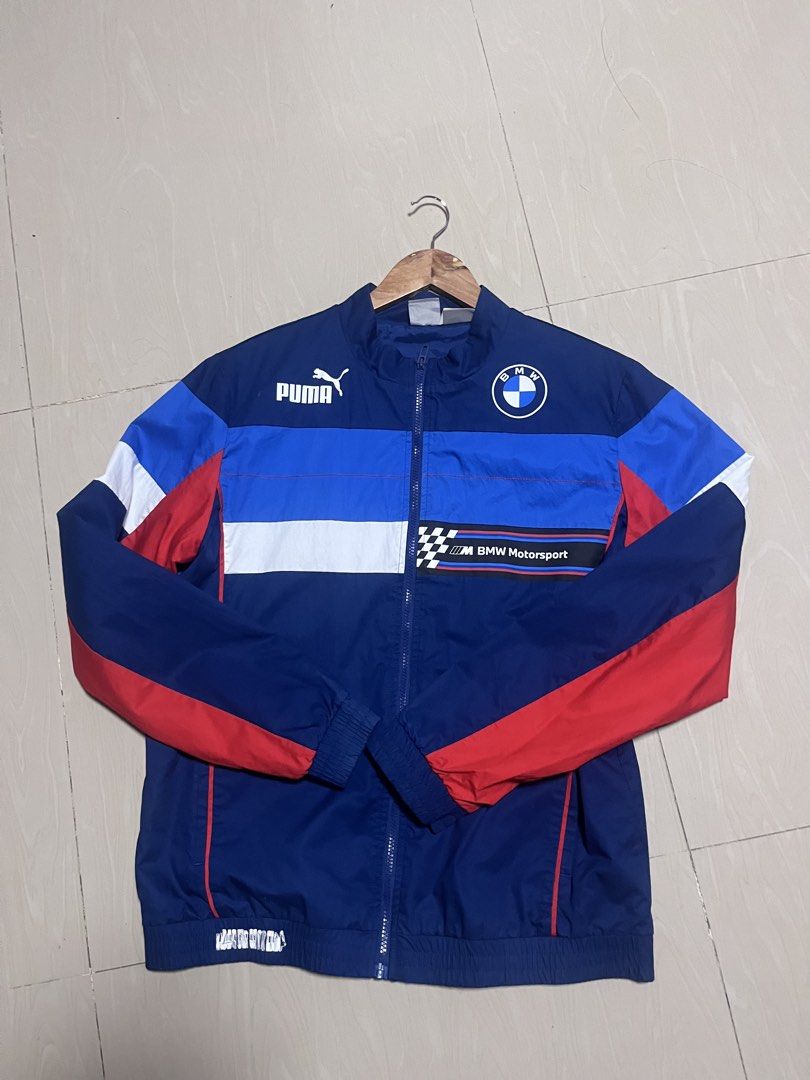Puma BMW Motorsport Track Jacket (Category: Coats, Jackets and Outerwear) located in Bacoor. Submitted by rtrpyu.2023 (Listing ID 1463596931, Image 1). Description: - Authentic Puma x BMW Motorsport collaboration jacket. - Features iconic BMW M color accents. - Full zip closure for easy wear. - Elasticated cuffs and hem for a comfortable fit. - Ideal for casual style or any BMW enthusiast. 27x22 Medium on tag.