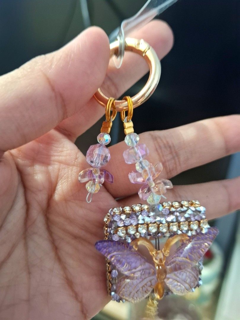 Purple Butterfly Rhinestone Phone Charm (Category: Charms) located in Quezon City. Submitted by an.marie (Listing ID 1463632533, Image 2). Description: Sparkly butterfly charm with purple and clear beads. Features a gold clasp. Perfect for phone, keys or bags..