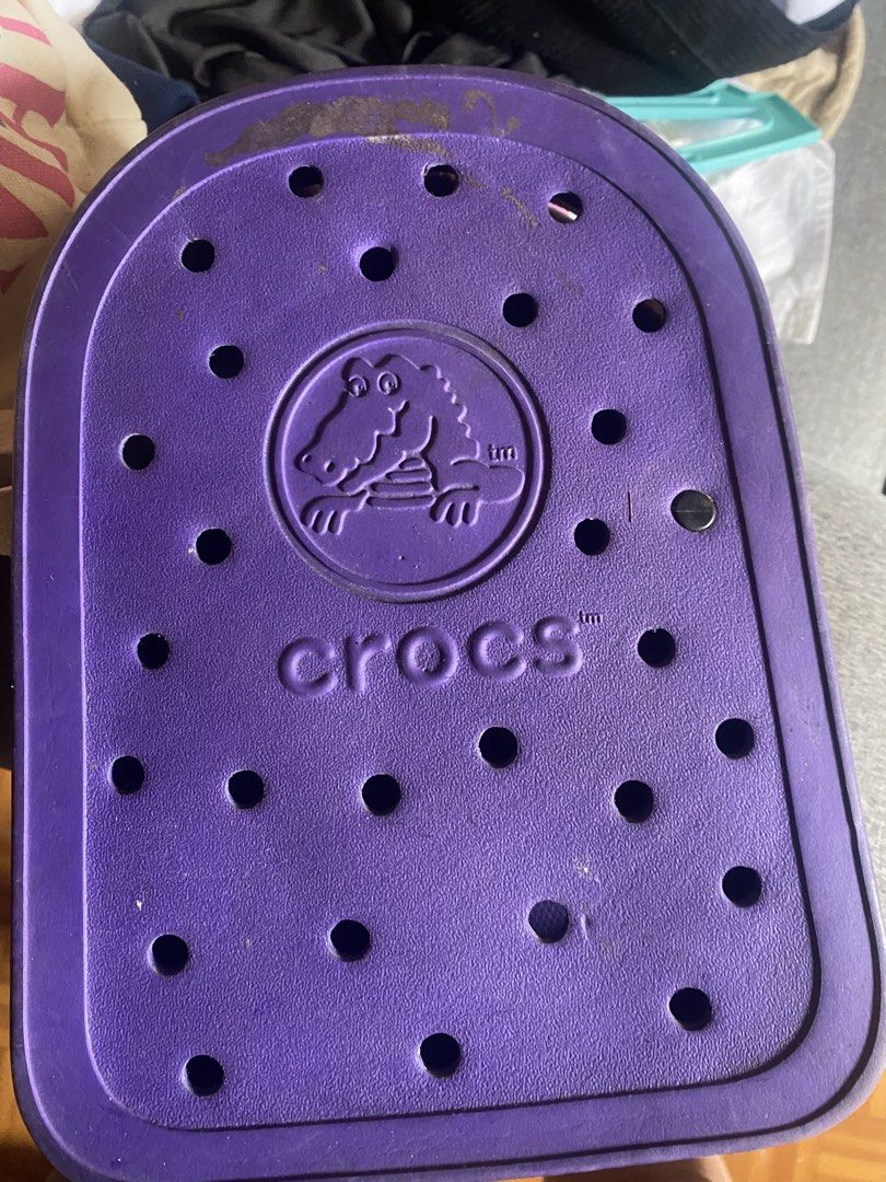 Purple Crocs Backpack with Iconic Sole Design (Category: Backpacks) located in Manila. Submitted by fp69gh6jpx80545 (Listing ID 1463676888, Image 3). Description: - Cool purple backpack from Crocs - Features the classic Crocs sole pattern on the bottom and back - Two adjustable straps for a comfortable fit - Secure zipper closure at the top - Great for kids or as a fun, stylish accessory.