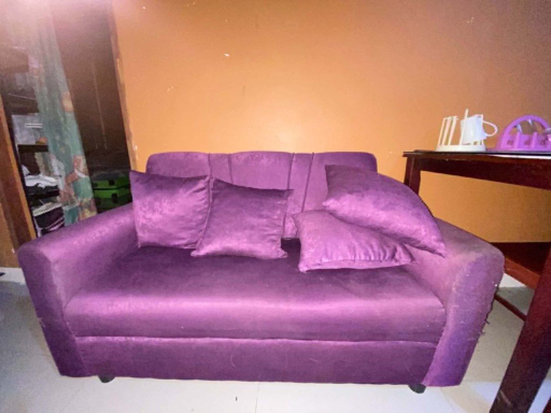 Purple Velvet 2-Seater Sofa with Cushions (Category: Sofas) located in Santa Rosa. Submitted by hermititis00 (Listing ID 1463703021, Image 2). Description: - Purple velvet sofa - Ideal for small living rooms or apartments - Comes with 4 matching throw pillows - No hidden issue Rfs: hindi kasya sa nilipatang apartment, need to buy a new one .