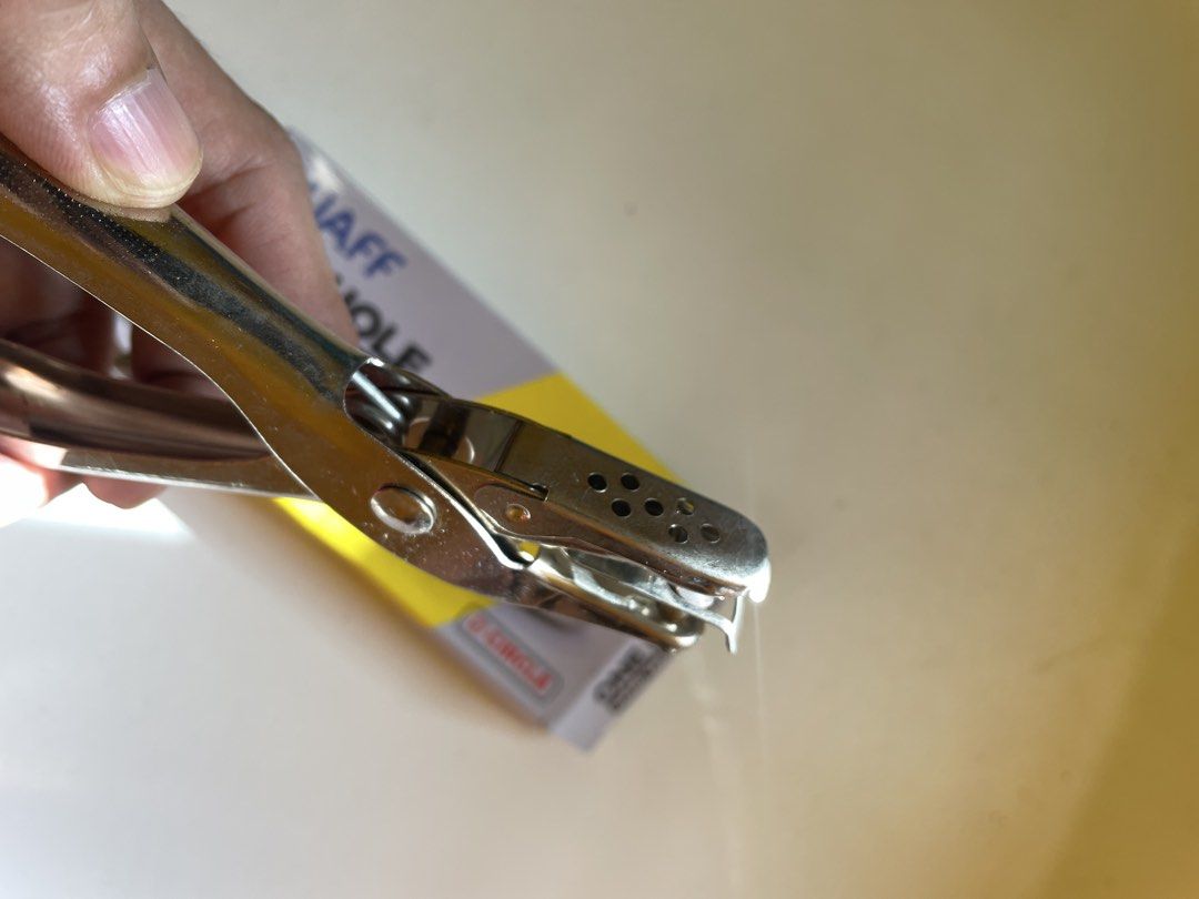Quaff One Hole Hang Tag Puncher 6mm (Category: Craft Supplies & Tools) located in Infanta. Submitted by frandez (Listing ID 1463583484, Image 2). Description: - Sturdy metal construction for durability. - Perfect for punching holes in hang tags. - Compact and portable design. - Simple and easy to operate. - Ideal for crafters and retail businesses. 6mm.