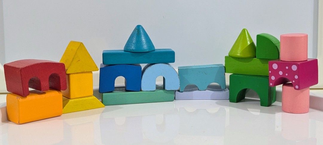 Rainbow Wooden Building Blocks Set for Kids (Category: Educational & Learning Toys) located in Quezon City. Submitted by furbous (Listing ID 1463586486, Image 3). Description: - Fun wooden blocks for building and imaginative play. - Includes various shapes: arches, triangles, cylinders, and cubes. - Bright, engaging colors. - Develops motor skills and creativity. - Perfect for toddlers and young children. - Made entirely of wood. -180 per set, la