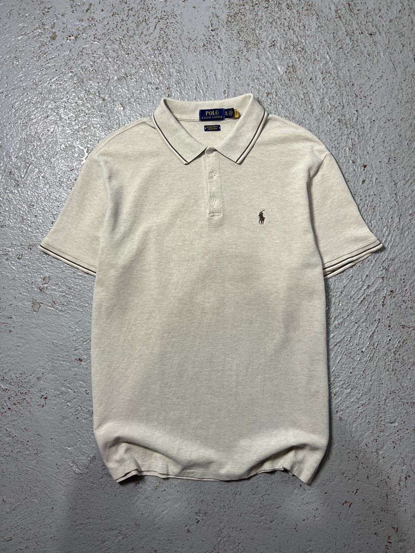 Ralph Lauren Beige Poloshirt (Category: Tshirts & Polo Shirts ) located in Davao. Submitted by don_jungco (Listing ID 1463665641, Image 1). Description: Condition: Like New Color rate: 10/10 Issue: Width - 23 Length - 29 Best Fit - L to XL With scannable QR CODE.