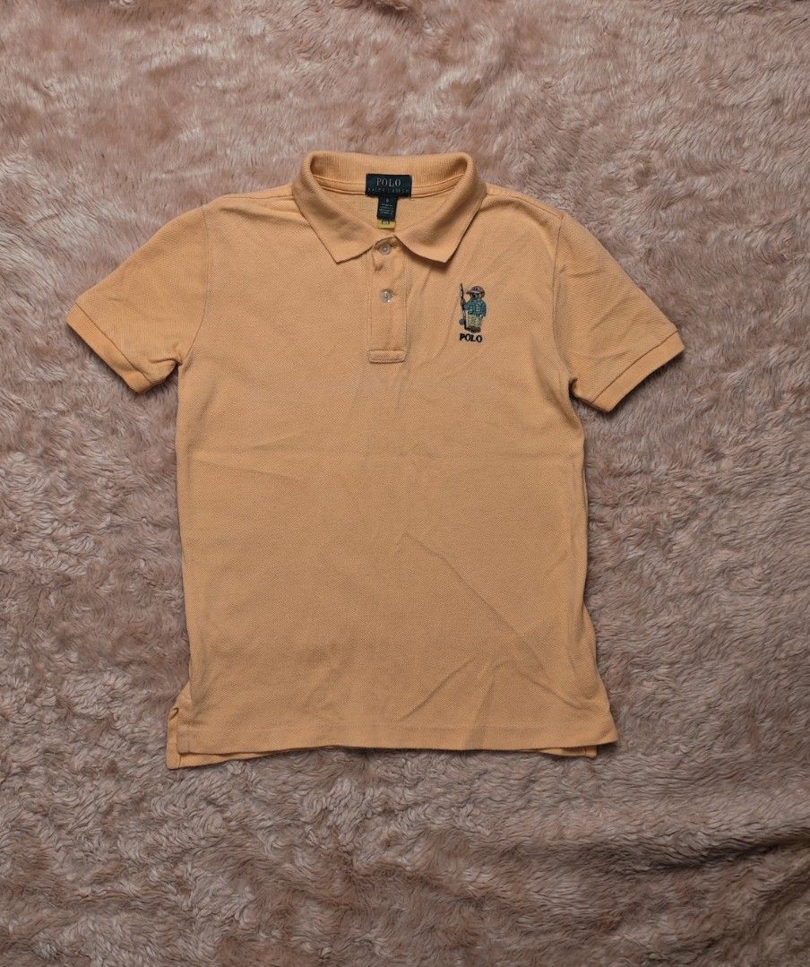 Ralph Lauren Kids Polobear (Category: Babies & Kids Fashion) located in Imus. Submitted by eykc01 (Listing ID 1463668338, Image 1). Description: Excellent to Like New *Minimal fine lint's barely noticeable 6-7yo Armpit to armpit: 15" Length: 20".