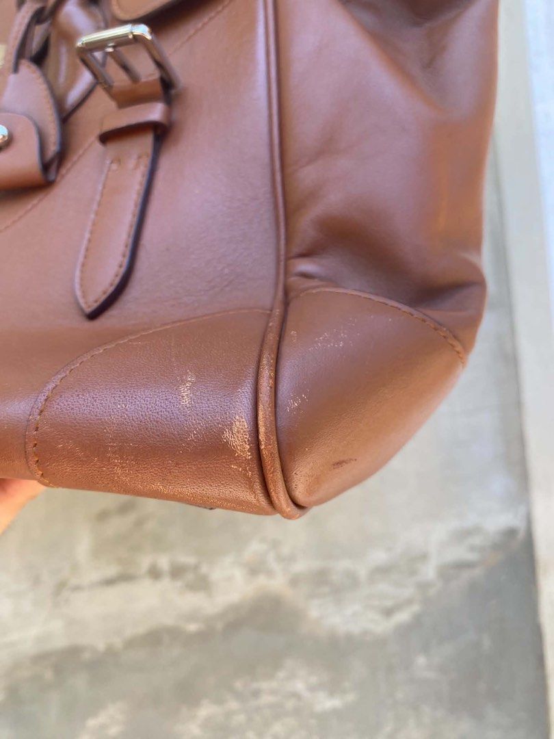 Ralph Lauren Ricky Bag 33 (Category: Luxury Bags & Wallets) located in Caloocan City. Submitted by thon0806 (Listing ID 1463652462, Image 2). Description: - Authentic Ralph Lauren brown leather satchel bag - Made in Italy - Secure turn-lock closure - Comfortable top handles - Minor scuffs on bottom corners - Small mark on one handle - Clean interior - Ideal for everyday use.