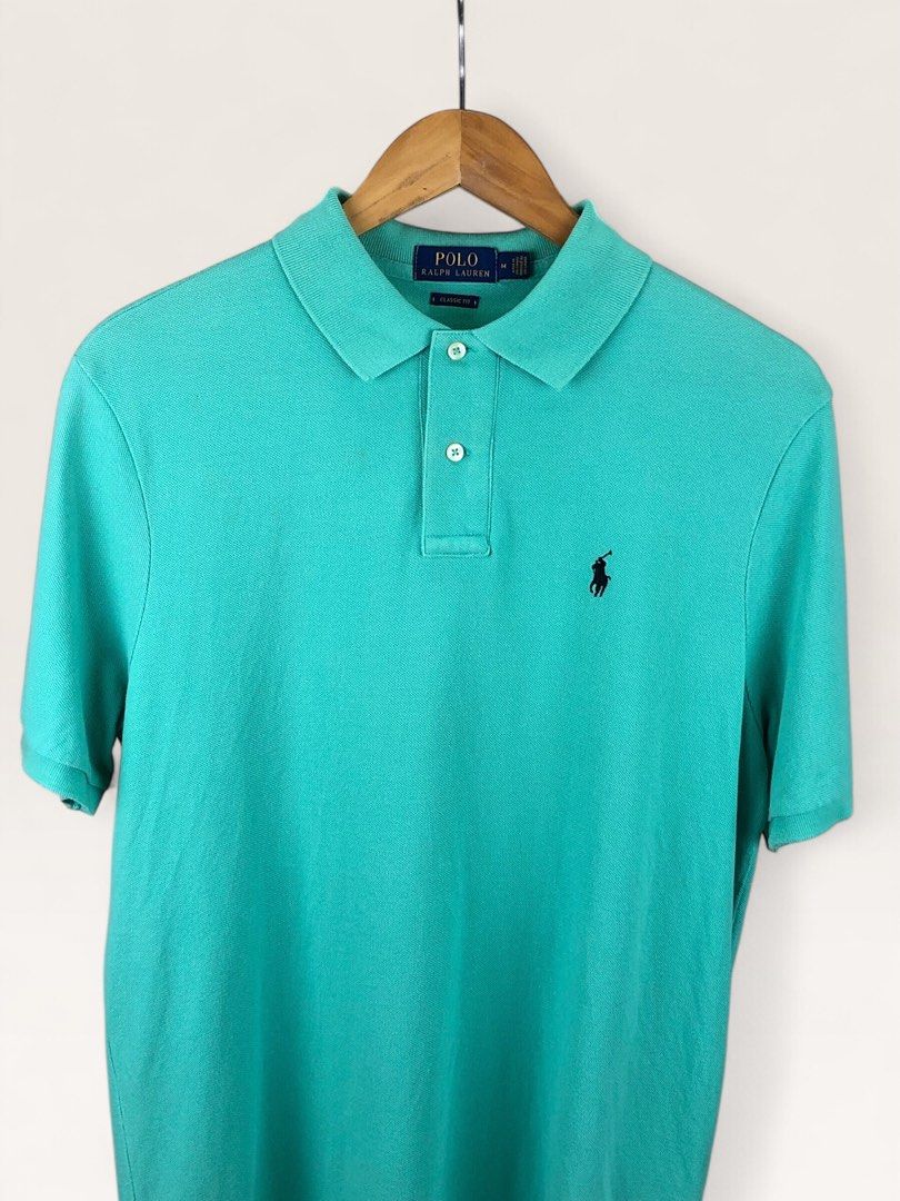 Ralph Lauren Teal Polo Shirt (Category: Tshirts & Polo Shirts ) located in Manila. Submitted by 12essentials (Listing ID 1463664736, Image 2). Description: 📌 Excellent Condition 📌 M on tag 📌 Length 30’ Width 21’.