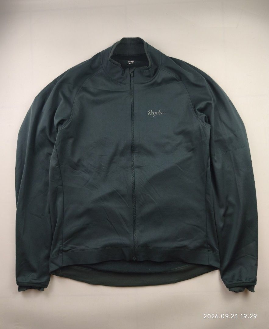 Rapha core winter jacket (Category: Activewear) located in Manila. Submitted by corner_finds (Listing ID 1463670136, Image 1). Description: The RAPHA Core Winter Jacket - SCA Dark Green is a cycling jacket designed for cold-weather riding. Its primary purpose is to provide insulation and protection from wind and light rain during winter cycling activities. Suitable for road cyclists and commuters, this jacket is part of Rapha's Core range, known 