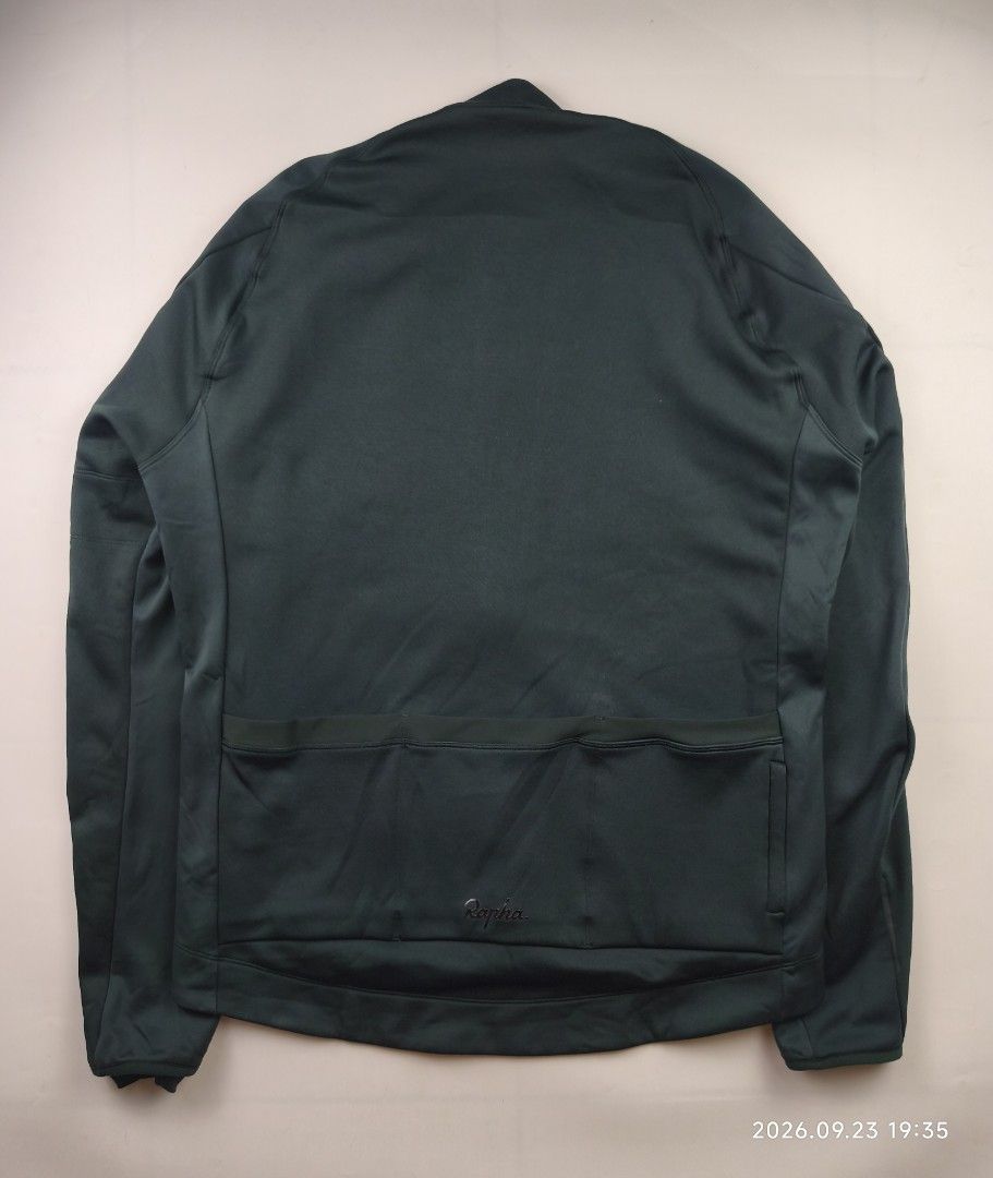 Rapha core winter jacket (Category: Activewear) located in Manila. Submitted by corner_finds (Listing ID 1463670136, Image 3). Description: The RAPHA Core Winter Jacket - SCA Dark Green is a cycling jacket designed for cold-weather riding. Its primary purpose is to provide insulation and protection from wind and light rain during winter cycling activities. Suitable for road cyclists and commuters, this jacket is part of Rapha's Core range, known 