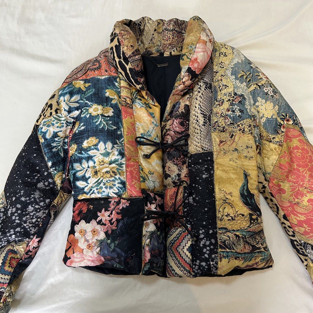 Rare Roberto Cavalli F/W 2002 100% Silk Patchwork Goose Down Puffer Jacket (Category: Luxury Apparel) located in Quezon City. Submitted by lilinred (Listing ID 1463728301, Image 3). Description: Authentic Roberto Cavalli silk patchwork puffer jacket from the 2002 collection. Archive statement piece and def one for Cavalli collectors Made from 100% silk with goose down filling. Print is still vibrant with no fading or stains Still in nice vintage 