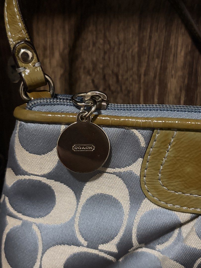 Rare Vintage Coach wristlet / minibag (Category: Purses & Pouches) located in Quezon City. Submitted by marsgarage (Listing ID 1463661968, Image 2). Description: PRICE NEGOTIABLE Rfs: not in use, too small for my liking 8 internal credit card slots Additional internal side pocket Silver Hardware No issues with zipper or metal..