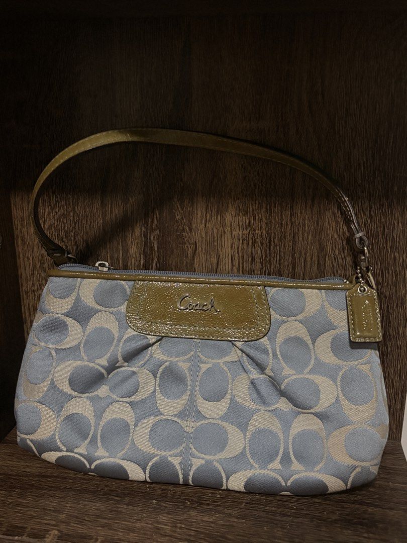 Rare Vintage Coach wristlet / minibag (Category: Purses & Pouches) located in Quezon City. Submitted by marsgarage (Listing ID 1463661968, Image 1). Description: PRICE NEGOTIABLE Rfs: not in use, too small for my liking 8 internal credit card slots Additional internal side pocket Silver Hardware No issues with zipper or metal..