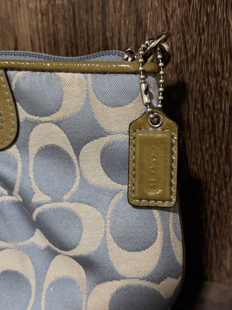 Rare Vintage Coach wristlet / minibag (Category: Purses & Pouches) located in Quezon City. Submitted by marsgarage (Listing ID 1463661968, Image 3). Description: PRICE NEGOTIABLE Rfs: not in use, too small for my liking 8 internal credit card slots Additional internal side pocket Silver Hardware No issues with zipper or metal..